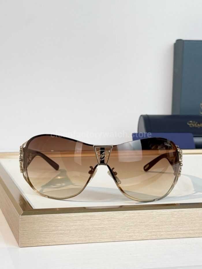 Chopard SCH863S Shield Sunglasses | Gold & Burgundy Frame with Brown Gradient Lens - Image 3