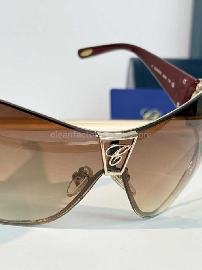 Chopard SCH863S Shield Sunglasses | Gold & Burgundy Frame with Brown Gradient Lens - Image 4