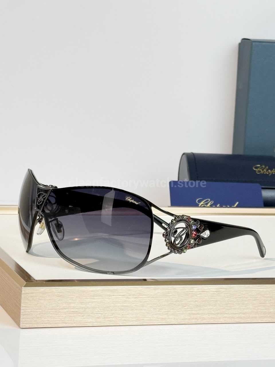 Chopard SCH863S Shield Sunglasses | Silver & Black Frame with Grey-Purple Gradient Lens