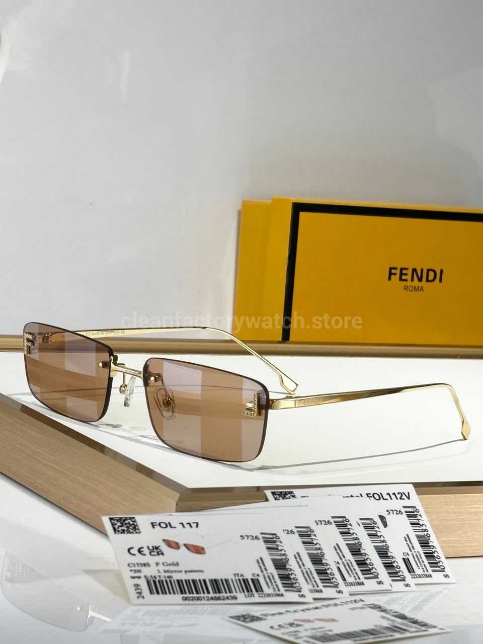 Fendi FE4172US Rimless Photochromic Eyeglasses | Gold-Tone Temples, Brown Photochromic Lenses & F-Shaped Accents