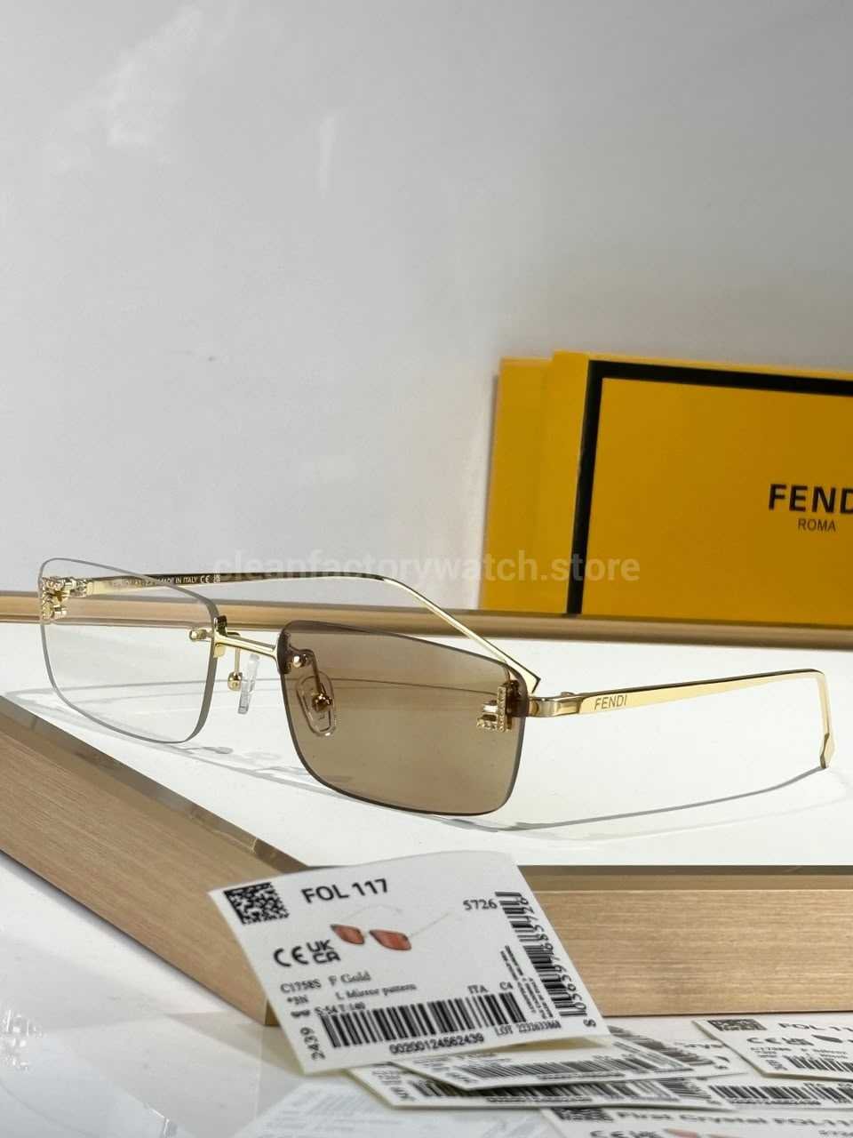 Fendi FE4172US Rimless Photochromic Eyeglasses | Gold-Tone Temples, Square Lenses & Letter Details