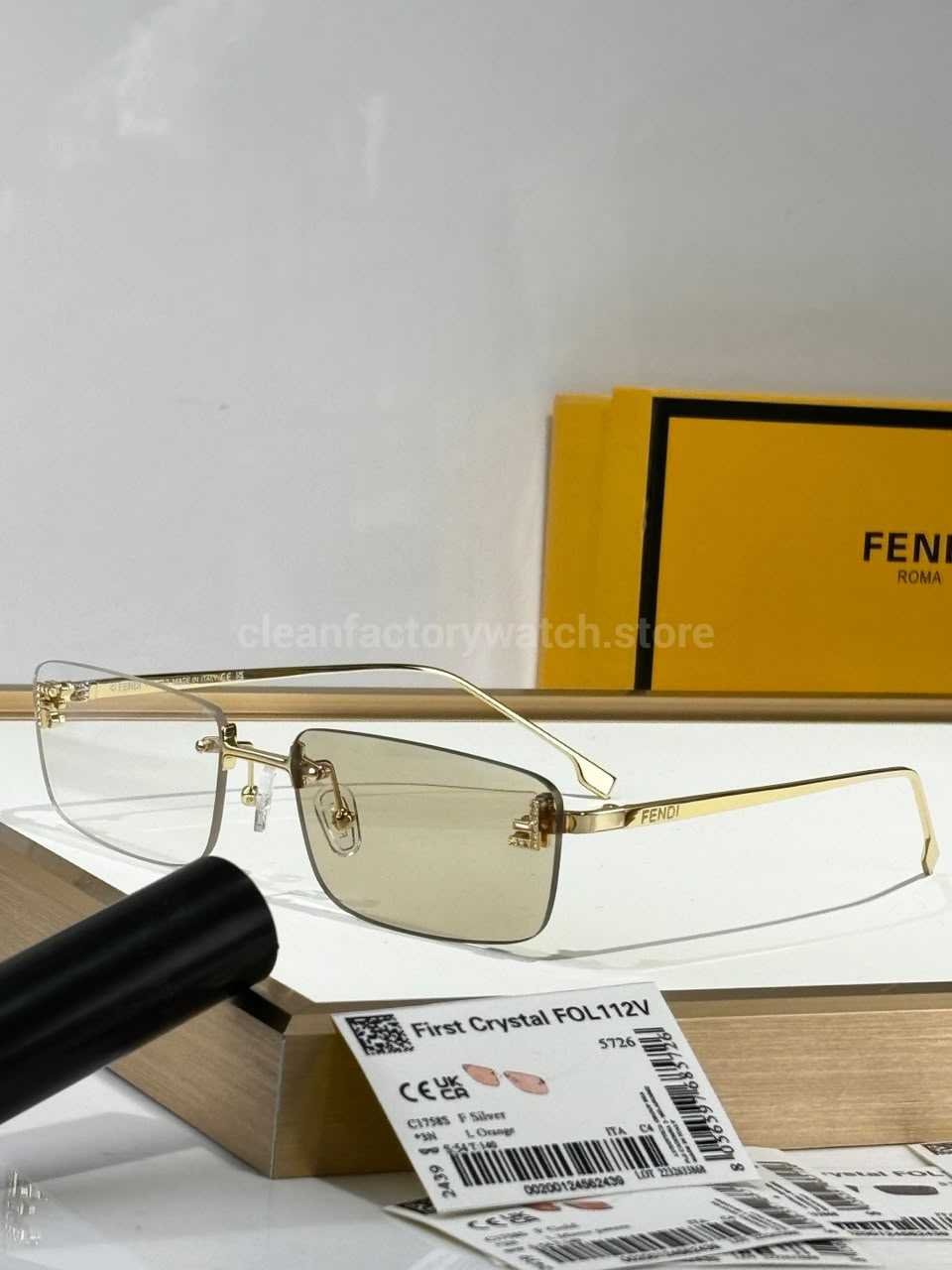 Fendi FE4172US Rimless Photochromic Eyeglasses  Gold-Tone Temples, Square Lenses & Letter Details
