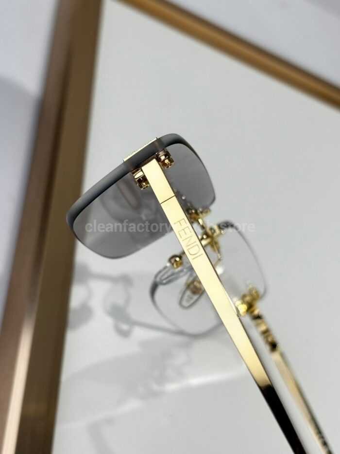 Fendi FE4172US Rimless Photochromic Eyeglasses | Gold-Tone Temples, Square Lenses & Letter Details - Image 3