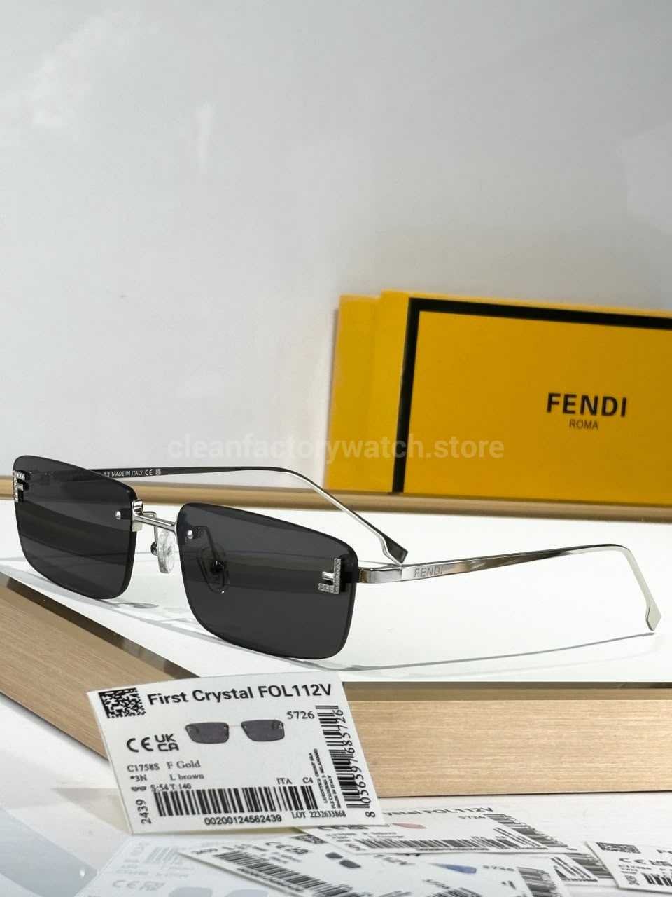Fendi FE4172US Rimless Photochromic Eyeglasses | Silver-Tone Temples, Dark Smoke Grey Lenses & Letter Details