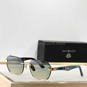 Maybach The Arttai Rimless Sunglasses | Gold-Tone Frame with Blue Marbled Temples and Grey Gradient Lenses