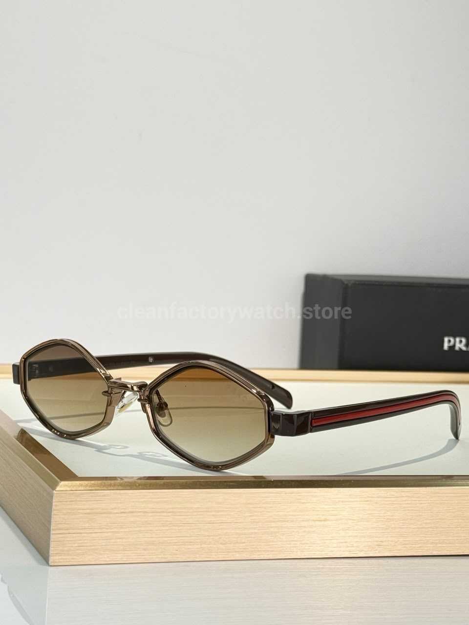 Prada SPS05X Geometric Sunglasses | Transparent Brown Frame, Red Temple Stripes & Brown Gradient Lenses