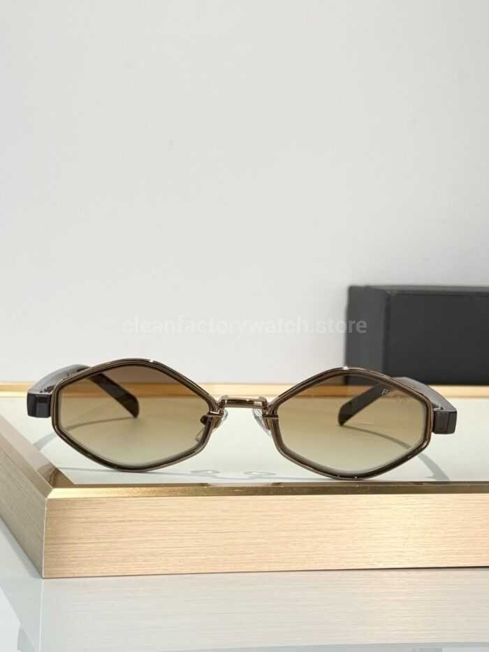 Prada SPS05X Geometric Sunglasses | Transparent Brown Frame, Red Temple Stripes & Brown Gradient Lenses - Image 2