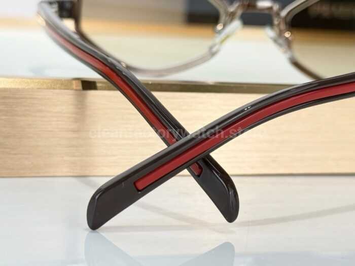 Prada SPS05X Geometric Sunglasses | Transparent Brown Frame, Red Temple Stripes & Brown Gradient Lenses - Image 7