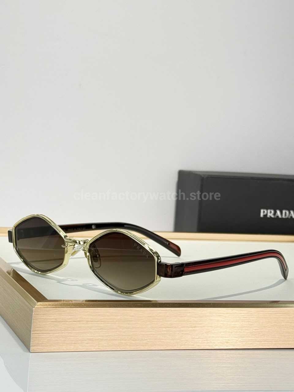 Prada SPS05X Geometric Sunglasses | Transparent Pale Yellow Frame, Red Temple Stripes & Brown Gradient Lenses