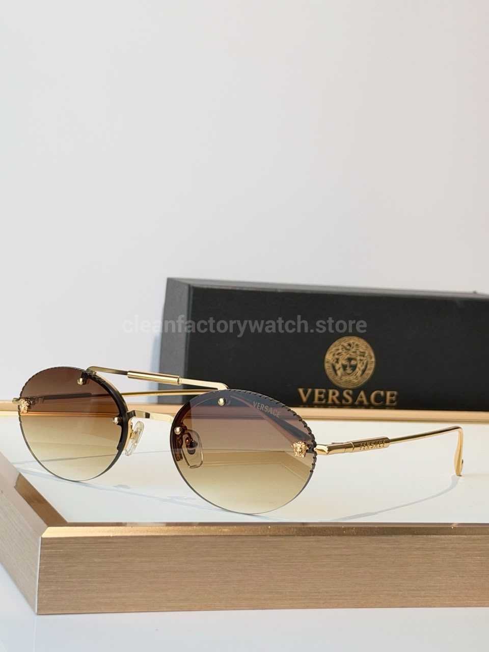 Versace VE2191 Round Sunglasses | Gold-Tone Frame with Brown Gradient Lenses