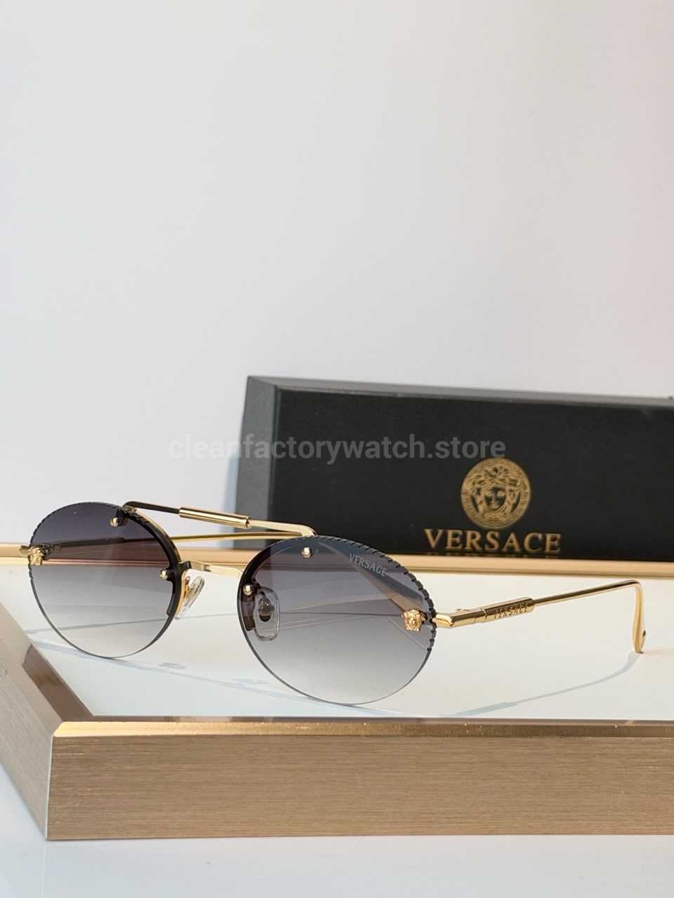Versace VE2191 Round Sunglasses Gold Tone Frame With Grey Gradient Lenses (1) Versace VE2191 Round Sunglasses | Gold-Tone Frame with Grey Gradient Lenses - Image 1