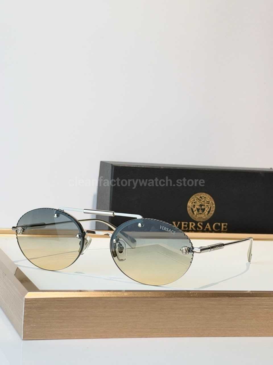 Versace VE2191 Round Sunglasses | Silver-Tone Frame with Blue-Grey to Yellow Gradient Lenses