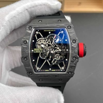 Classic New Factory RM 35-01 replica watch with black carbon fiber case, black rubber strap and black skeletonized dial.